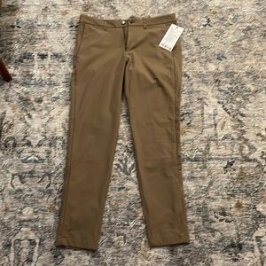 Lulu Lemon brown Commission Pants Slim. 33Wx34L. New with Tags